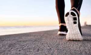 female runner on pavement